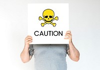 People holding placard with skull icon and chemicals dangerous