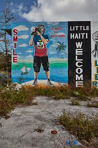                         Part of a large welcome mural in Miami, Florida's Little Haiti, long a neighborhood populated by many Haitian exiles, which in the early 21st Century became home to other Caribbean immigrants and Hispanics from elsewhere in Central and South America                        