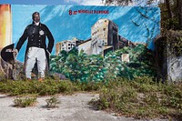                         Part of a large welcome mural in Miami, Florida's Little Haiti, long a neighborhood populated by many Haitian exiles, which in the early 21st Century became home to other Caribbean immigrants and Hispanics from elsewhere in Central and South America                        