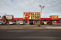                         There's no way to miss this and adjacent signs at a beachwear shop along the commercial strip in Destin, Florida, a popular beach community in the "Panhandle" portion of the state above the Gulf of Mexico                        