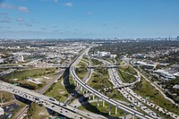                         A "spaghetti bowl" of intertwining freeways and causeway in Miami Gardens, Florida, a city just above Miami                        