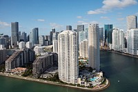                        Aerial view from Biscayne Bay, separating Miami Beach and Miami, Florida, of part of the Miami skyline                        