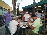                         Men enjoy a game at Domino Park in the historic Little Havana neighborhood of Miami, Florida                        