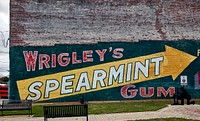                         An old Wrigley's Spearmint Gum advertising mural on a wall along a park in Trenton, a small city in central Florida                        