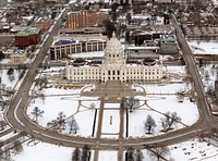                         Wintertime aerial view of architect Cass Gilbert's majestic Minnesota Capitol in St. Paul which--along with neighboring Minneapolis--is one of Minnesota's famous "Twin Cities." Immediately behind and to the left of the capitol in this image is the new (as of 2016) state Senate Office building                        
