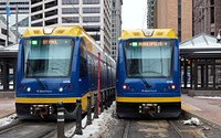                         Metro Transit light-rail trains pass each other in downtown Minneapolis, which--along with neighboring St. Paul--is one of Minnesota's famous "Twin Cities"                        