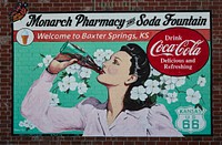                         A combination welcome sign and vintage Coca-Cola advertising display in Baxter Springs, a town in the extreme southeast corner of Kansas                        