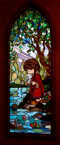                         An intricate and colorful stained-glass window at the Precious Moments Chapel near Carthage, Missouri                        