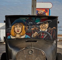                         A humorous depiction of the legendary 1930s Bonnie and Clyde outlaw team (Bonnie Parker and Clyde Barrow) at Bud's Tire Shop in Springfield, Missouri                        