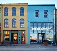                         Downtown stores in Hannibal, a city along the Mississippi River in northeast Missouri, so famous as the boyhood home of the legendary writer and wit, later called "the Father of American Literature" by fellow author William Faulkner, where images, signs, and stories of Twain, born Samuel Langhorne Clemens, can be found on what seems like every block in town                        