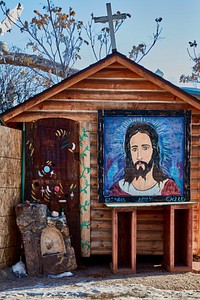                        A tiny chapel at the entrance to Chimayo, a New Mexico village on the "High Road," a winding route through the Sangre de Cristo mountains to and from the capital city of Santa Fe and the art and shopping mecca of Taos                        