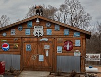                         A large pig fittingly occupies a commanding position at the Missouri Hick barbecue restaurant in Cuba, Missouri, named after the island of Cuba in 1857 for reasons that are murky today                        