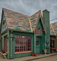                         The classic, c.-1932 cottage-style Phillips-66 station, now (as of 2021) the Fourway restaurant and snack store, along the historic, mostly two-lane, U.S. Route 66 in Cuba, Missouri, named after the island of Cuba in 1857 for reasons that are murky today                        