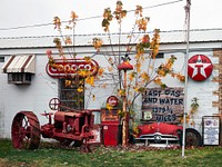                         Display outside Don's Old Cars & Antiques store along old U.S. Route 66 in Springfield, Missouri, through which a portion of the historic two-lane road still zigs and zags                        