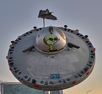                         This rendition of a flying saucer and its friendly-looking "pilot" doesn't cause much of a stir in in Socorro, a small city in central New Mexico                        