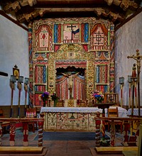                         Interior view of El Santuario de Chimayo, a Roman Catholic church on ground that was a worship space even before its construction in 1813 in Chimayo, a New Mexico village on the "High Road," a winding route through the Sangre de Cristo Mountains                        