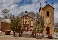                         The Santo Nino de Atocha Chapel, built in 1857 in Chimayo, a New Mexico village on the "High Road" through the Sangre de Cristo mountains to and from the capital city of Santa Fe and the art and shopping mecca of Taos                        