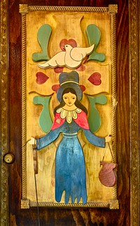                         Artwork depicting Santo Niño, "Jesus as a boy" at the Santo Niño Prayer Portal, a separate building from the nearby Santo Niño de Atocha children's chapel, in Chimayo, a small town and cluster of colorful plazas or placitas, each with its own name on what's called the "High Road," a winding route through the Sangre de Cristo Mountains to and from the capital city of Santa Fe and the art and shopping mecca of Taos                        