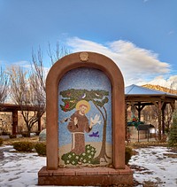                         A biblical mosaic along a pathway containing shrines and stations of the cross behind the El Santuario de Chimayo, a humble but incredibly popular shrine in Chimayo, a New Mexico village on the "High Road," a winding route through the Sangre de Cristo Mountains to and from the capital city of Santa Fe and the art and shopping mecca of Taos                        