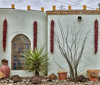                         Chiles hang on the wall of the La Posta Restaurant on the plaza of Mesilla (locally called Old Mesilla), a historic town adjacent to Las Cruces, the hub city of southern New Mexico                        