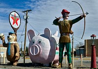                         The Yogi Bear cartoon character, a pink pig, and Robin Hood keep unlikely company at Sparky's Burgers & BBQ (barbecue), a must-see roadside attraction in tiny Hatch, New Mexico, north of Las Cruces, that offers not only green-chili cheeseburgers, espresso, and other coffee drinks but also what one might call vintage, sometimes giant and funky, memorabilia assembled over 20 years by Sparky's owners, Josie Nunn and her husband, Teako                        