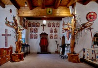                         An interior room at the Santo Niño de Atocha Chapel, built in 1857 in Chimayo, a New Mexico village on the "High Road" through the Sangre de Cristo mountains to and from the capital city of Santa Fe and the art and shopping mecca of Taos                        