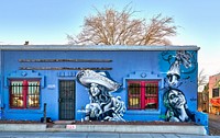                         One of several exuberantly painted adjacent buildings on a narrow, two-lane street that was once the main road from the west into Las Cruces, the hub city of southern New Mexico, 27 miles from the border with far-western Texas                        