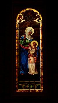                         A richly shimmering stained-glass window of the Basilica of San Albino on the plaza of Mesilla (locally called Old Mesilla), a historic town adjacent to Las Cruces, the hub city of southern New Mexico                        