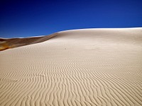                         The site's trademark rippling waves accent the experience at White Sands National Park in southern New Mexico's Tularosa Basin                        