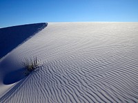                         The site's trademark rippling waves accent the experience at White Sands National Park in southern New Mexico's Tularosa Basin                        