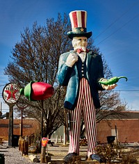                         An oversized Uncle Sam, here as a hot-pepper fan, at Sparky's Burgers & BBQ (barbecue), a must-see roadside attraction in tiny Hatch, New Mexico, north of Las Cruces, that offers not only green-chili cheeseburgers, espresso, and other coffee drinks but also what one might call vintage, sometimes giant and funky, memorabilia assembled over 20 years by Sparky's owners, Josie Nunn and her husband, Teako                        