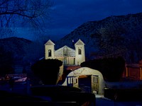                         Early evening view of the El Santuario de Chimayo, a humble but incredibly popular shrine in Chimayo, a New Mexico village on the "High Road," a winding route through the Sangre de Cristo Mountains to and from the capital city of Santa Fe and the art and shopping mecca of Taos                        