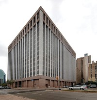                         The Earle Cabell building and U.S. Courthouse, built in 1971 shares a wall with the Art Deco-style Federal Building, previously known as the Santa Fe Building                        