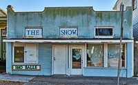                         An unusual business combo called The Snow that serves as both a "sno-ball" stand and a nail salon in Algiers, a historic New Orleans, Louisiana, neighborhood that is the only part of the city on the West Bank, or west bank, of the Mississippi River. Called sno-balls in the New Orleans area and sno-cones in many other parts of the nation, these are shaved-ice treats, doused in sweet flavored syrup                        