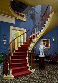                         A remarkable, freestanding spiral staircase, built in 1828, in the manor home at Houmas House and Gardens, a Louisiana plantation-era attraction that includes visitor lodging, restaurants and a bar, and the most extensive gardens in "Plantation Country" along the winding Mississippi River Road near the tiny town of Darrow in Ascension Parish                        