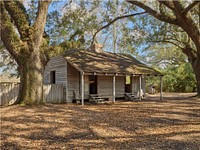                         Slave quarters on the grounds of Oak Alley in Vacherie, Louisiana, one of the historic former plantations on the River Road that winds along the Mississippi River in the southern U.S. state                        