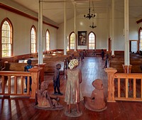                         Artist Woodrow Nash's sculptures of newly emancipated (freed) slave children at the freed-slave-built Antioch Baptist Church on the grounds of Whitney Plantation, one of several surviving antebellum plantation museums, but this one with a fascinating twist, along the "River Road," the Mississippi River, near the tiny town of Wallace, Louisiana                        