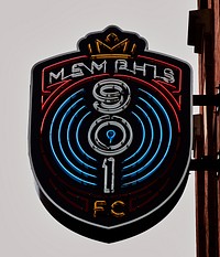                         Neon sign for the Memphis 901 FC soccer club (the team uses FC for "football club," more familiar terminology worldwide) on an exterior wall of Auto Zone Stadium, where, as of 2021, the Memphis Redbirds Triple-A professional baseball team also plays in Memphis, Tennessee                        