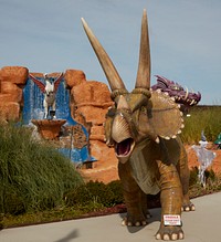                         All sorts of creature figures, including a prehistoric horned triceratops (foreground) overlook the games of miniature golf at the Fantasy Golf attraction in Pigeon Forge, a once-sedate farming community turned quirky entertainment mecca in eastern Tennessee                        