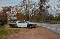                         More than a few speeders along old Tennessee Route 46 have been fooled into thinking this is an up-to-date, functioning, speed-trapping police cruiser in Leiper's Fork, a small, rural Tennessee community named for pioneer surveyor Hugh Leiper that has become somewhat of a tourist attraction near an entrance to the Natchez Trace Parkway (a 444-mile two-lane scenic road through Tennessee, a bit of Alabama, and Mississippi)                        