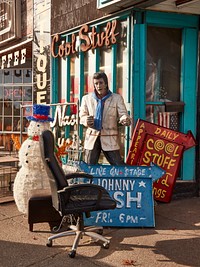                         An Elvis (Presley) lookalike and other oddities outside the Cool Stuff & Weird Things shop along an eclectic strip of Charlotte Avenue, a mile or so from Vanderbilt University in Nashville, the capital city of the U.S. state of Tennessee and, by reputation and accomplishment, of American country music                        