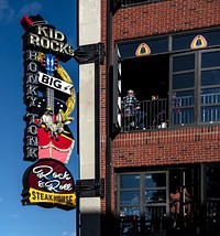                         Sign for Kid Rock's Big Ass (sanitized with two lightning bolts) Honky Tonk Rock N' Roll Steakhouse in Nashville, the capital city of the U.S. mid-South city Tennessee                        