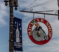                         Two signs, one erected by the city and another by a local business in Columbia, Tennessee                        