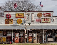                         View of Ike's Amish Depot & Country Store, which served not only as a general store along the road in tiny Ethridge, Tennessee, but was also the bus depot for the scattered population of Amish farmers and their families in the rural area                        