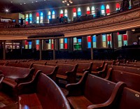                         The pew-like seating and church-like windows of the legendary 2,362-seat Ryman Auditorium concert and events hall in Nashville, the capital city of the mid-South U.S. state of Tennessee                        