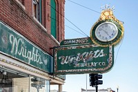                         A handsome street clock and overhead sign for Wright's Jewelry Store in St. Joseph, the principal city in the northwest corner of Missouri                        