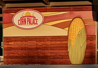                         An advertising sign across the street from the Corn Palace, an arena and event venue that is one of Midwest America's most popular tourist attractions (whose advertising makes it clear that it's the world's ONLY corn palace), in the small city of Mitchell, South Dakota                        