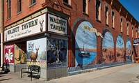                         A downtown corner that includes a mural depicting scenes on the Missouri River in Yankton, a small city on that river and the Nebraska border in the southeast corner of South Dakota                        