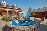                         A fountain (dry in early fall) at Storybook Land, a family attraction in Aberdeen, a small city in northeast South Dakota that was founded by a railroad executive whose boss was born in Aberdeen, Scotland, hence the choice of the new town's name                        