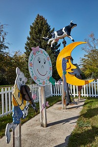                         A cat and a fiddle, and a cow jumping over the moon at Storybook Land, a family attraction in Aberdeen, a small city in northeast South Dakota that was founded by a railroad executive whose boss was born in Aberdeen, Scotland, hence the choice of the new town's name                        
